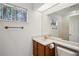 Bathroom featuring a sink, and a large mirror at 2814 Cobb Place Manor Ct, Marietta, GA 30066