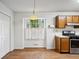 Kitchen featuring stainless steel appliances, wooden cabinets, and natural light at 2814 Cobb Place Manor Ct, Marietta, GA 30066