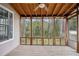 Screened in porch with natural light and wood floors at 2814 Cobb Place Manor Ct, Marietta, GA 30066