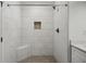 New bathroom with modern tiled shower with bench and niche at 2814 Cobb Place Manor Ct, Marietta, GA 30066