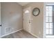 Inviting foyer with natural light and sleek wood-look floors at 3814 Whaley Ct, Snellville, GA 30039