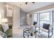 Bright living room with plush seating and bay windows at 3814 Whaley Ct, Snellville, GA 30039
