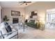 Bright living room with stone fireplace, plush seating, and stylish decor at 3814 Whaley Ct, Snellville, GA 30039