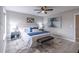 Comfortable main bedroom with neutral tones, a large bed, and decorative accents at 3814 Whaley Ct, Snellville, GA 30039