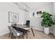 Bright home office features modern light fixture, hardwood flooring, and large windows at 486 Broom Dr, Cumming, GA 30040