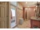 Beautiful bathroom with tiled walk-in shower and a double sink vanity with granite countertop at 51 Muirfield Ct, Hiram, GA 30141