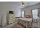 Cozy bedroom with soft carpeting, a ceiling fan, and abundant natural light at 51 Muirfield Ct, Hiram, GA 30141