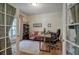 Bright home office with hardwood floors, neutral paint, and ample natural light at 51 Muirfield Ct, Hiram, GA 30141