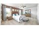Comfortable main bedroom featuring plush carpet, neutral decor, and natural light at 12106 Conrad Cir, Hampton, GA 30228