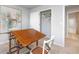 Bright room with a drafting table, closet, and doorway leading to a bathroom at 12106 Conrad Cir, Hampton, GA 30228