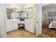 Well lit bathroom with dual sinks, vanity area, and tile floor offers plenty of space at 4224 Gateland Ave, Marietta, GA 30062