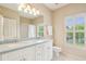 This bathroom has a double vanity with great natural light shining through the window at 4224 Gateland Ave, Marietta, GA 30062