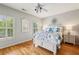 This bedroom boasts hardwood floors, natural light, and neutral walls at 4224 Gateland Ave, Marietta, GA 30062