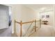 Upstairs hallway with staircase, plush carpet, and access to living areas at 4224 Gateland Ave, Marietta, GA 30062