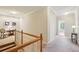 A spacious hallway with carpeting and an area for decor and a reading chair at 4224 Gateland Ave, Marietta, GA 30062
