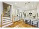 Bright kitchen with stainless steel appliances, granite counters, breakfast bar, and pendant lighting at 4224 Gateland Ave, Marietta, GA 30062