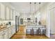 Bright kitchen with stainless steel appliances and hardwood floors, ideal for cooking at 4224 Gateland Ave, Marietta, GA 30062