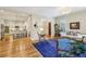 Bright living room boasts hardwood floors, and flows into an eat-in kitchen with modern appliances at 4224 Gateland Ave, Marietta, GA 30062