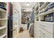 Organized walk-in closet with built in shelves and drawers offers ample storage at 4224 Gateland Ave, Marietta, GA 30062