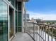 Balcony view showcases city skyline and neighborhood, accessible via sliding glass doors at 923 Peachtree Ne St # 1334, Atlanta, GA 30309