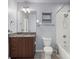 Modern bathroom features granite vanity top, new hardware, and bathtub with a shower at 923 Peachtree Ne St # 1334, Atlanta, GA 30309