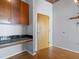 Hallway with hardwood floors and desk area at 923 Peachtree Ne St # 1334, Atlanta, GA 30309