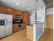 Open kitchen with stainless steel appliances, dark countertops, and a breakfast bar at 923 Peachtree Ne St # 1334, Atlanta, GA 30309