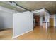 Spacious living area with hardwood floors adjacent to the stainless steel kitchen appliances at 923 Peachtree Ne St # 1334, Atlanta, GA 30309