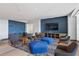 Cozy lounge area with comfortable seating and TV, perfect for relaxation at 923 Peachtree Ne St # 1334, Atlanta, GA 30309