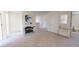 Upstairs loft space with neutral walls, comfortable seating, and decorative art, perfect for relaxation at 2399 Argento Cir, Dacula, GA 30019