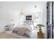 Bright bedroom with a modern chandelier, comfortable bed, and natural light at 3336 Myrtle St, Atlanta, GA 30354