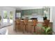 Bright eat-in kitchen with stainless steel appliances, a center island, and modern cabinets at 3336 Myrtle St, Atlanta, GA 30354