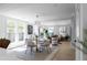 Bright and airy living room with natural light, modern furnishings, and open floor plan at 3336 Myrtle St, Atlanta, GA 30354