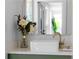 Close-up of the bathroom sink with gold faucet and marble countertop at 3336 Myrtle St, Atlanta, GA 30354