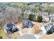 Aerial view of a home in a community with mature trees and landscaping at 4803 Austin Hills Dr, Suwanee, GA 30024
