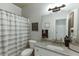 Cozy bathroom featuring granite countertops and a shower with curtain at 4803 Austin Hills Dr, Suwanee, GA 30024