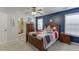 Bedroom featuring baseball themed decorations and wooden furniture at 4803 Austin Hills Dr, Suwanee, GA 30024