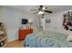 Bedroom with a ceiling fan, a dresser, and neutral colored walls at 4803 Austin Hills Dr, Suwanee, GA 30024