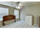 Bright bedroom with neutral walls, carpeted floors and a large dresser at 4803 Austin Hills Dr, Suwanee, GA 30024
