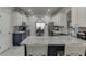Bright kitchen with stainless steel appliances, granite countertops, and dining area view at 4803 Austin Hills Dr, Suwanee, GA 30024