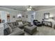 Open living room featuring neutral colors, plush furniture and modern decor at 4803 Austin Hills Dr, Suwanee, GA 30024