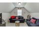 Upstairs living room with comfortable furniture, and baseball themed decorations at 4803 Austin Hills Dr, Suwanee, GA 30024