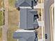 A birds eye view of the house and neighborhood provides a great sense of location and surrounding landscape at 117 Villanueva Rd, Woodstock, GA 30188