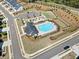 Aerial view of the community pool and amenity area showcasing the recreational options available to residents at 117 Villanueva Rd, Woodstock, GA 30188