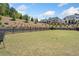 Well-maintained green space within a fenced community area, offering a relaxing outdoor environment at 117 Villanueva Rd, Woodstock, GA 30188