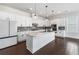 Modern kitchen featuring white cabinets, a center island, and stainless steel appliances at 117 Villanueva Rd, Woodstock, GA 30188