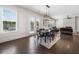 Spacious living room with hardwood floors, fireplace, and bright natural light at 117 Villanueva Rd, Woodstock, GA 30188