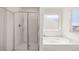Bathroom featuring stand up shower and seperate bathtub at 12098 Conrad Cir, Hampton, GA 30228
