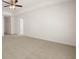 Spacious bedroom with neutral carpet, ceiling fan, and ample natural light at 12098 Conrad Cir, Hampton, GA 30228