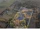 A private estate featuring a pond, mature trees, and verdant acreage at 12421 Highway 36, Covington, GA 30014